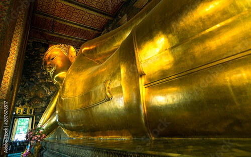 Reclining Buddha Golden  statue in Bangkok. wat pho temple.