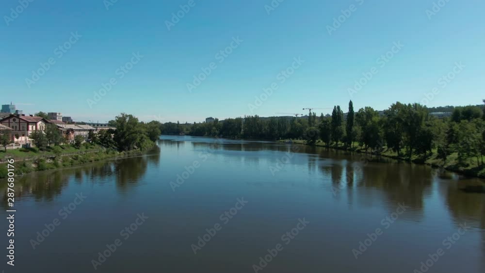 aerial flight over vltava river next to bridges sunny day of summer in Prague aerial flight over vltava river next to bridges sunny day of summer in Prague