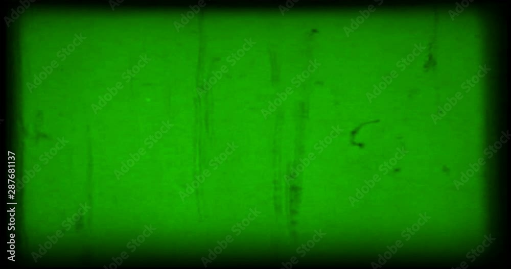 green vintage old grunge film strip frame background, old movie damage flicker effect, retro movie glitch effect with spot and dust on chroma key green screen