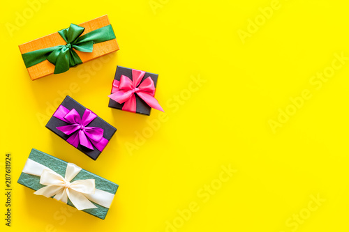 gifts frame on yellow background top view mock up