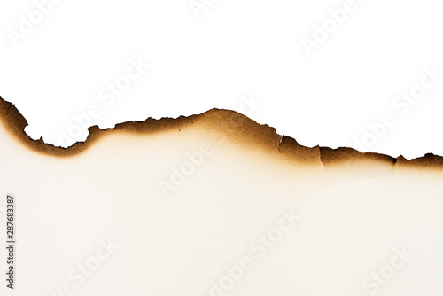 Burn old brown paper half on white texture background