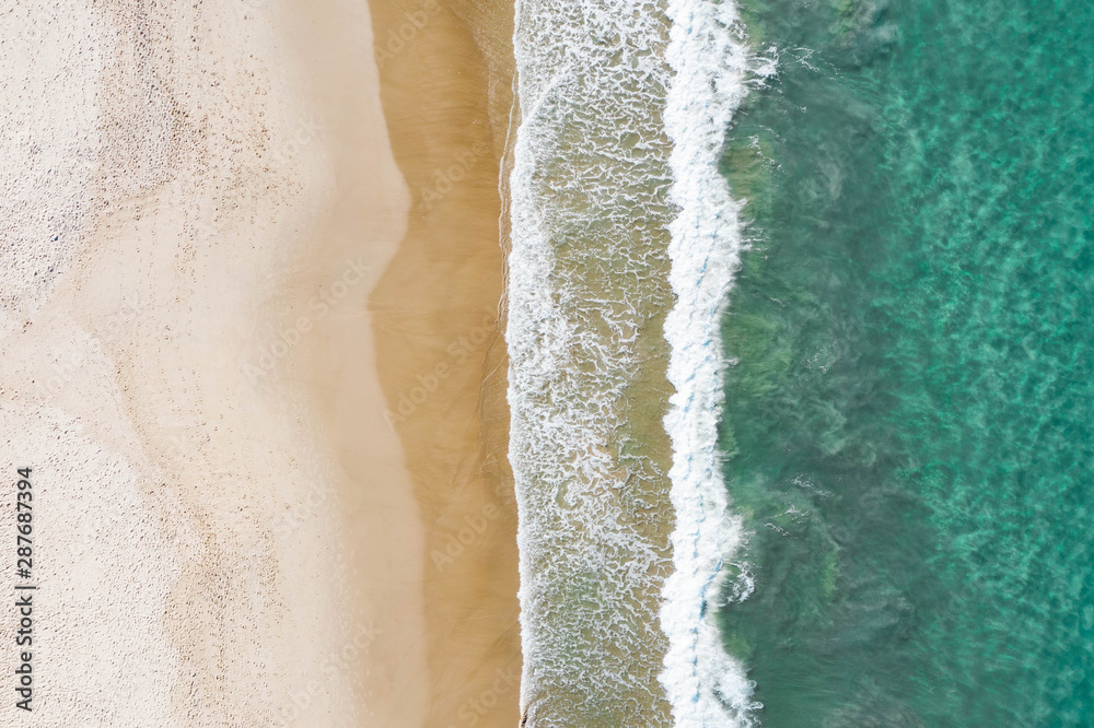 Beach aerial at sunset with nice white beach, warm water in the sea and shadows of beach trees, palm. Beach aerial at sunset with nice white beach, warm water in the sea and shadows of beach trees, palm.
