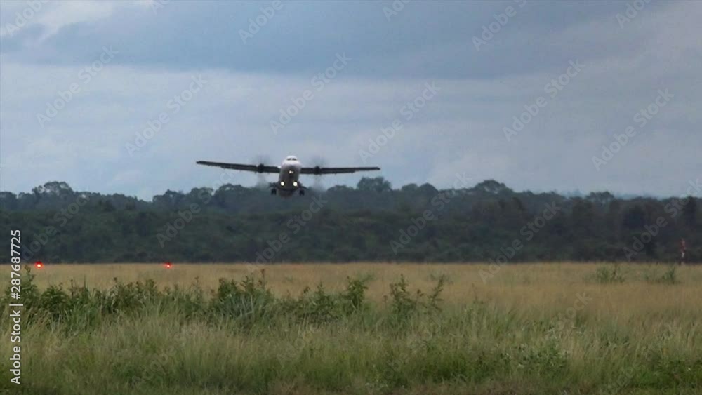 Wide Shot of a Plane Taking Off From the Runway in Slow Motion Wide Shot of a Plane Taking Off From the Runway in Slow Motion