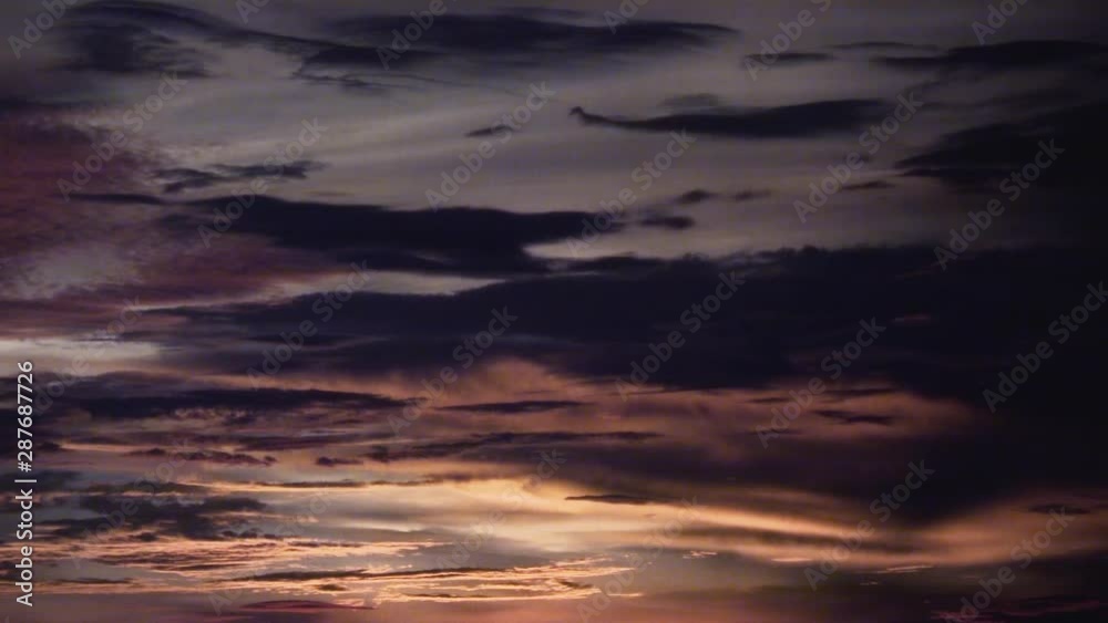 Beautiful Tropical Sunset with Golden Skies and Large Cloud Formations Beautiful Tropical Sunset with Golden Skies and Large Cloud Formations