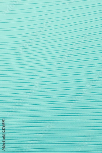 The background or wallpaper surface has a patterned line.