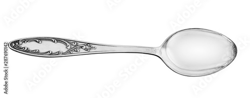 Obraz na płótnie Silver spoon close-up on isolated white background