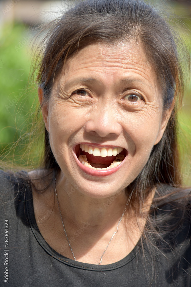 An Old Female Senior Smiling An Old Female Senior Smiling