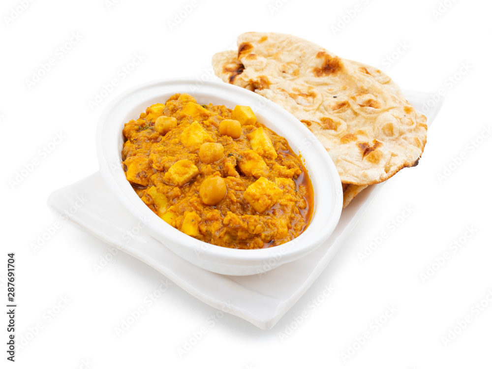 North Indian Healthy Cuisine Chole Paneer or Chole Paneer Curry Served with Tandoori Roti, Made From Boiled Chickpea with Cottage Cheese and Spices North Indian Healthy Cuisine Chole Paneer or Chole Paneer Curry Served with Tandoori Roti, Made From Boiled Chickpea with Cottage Cheese and Spices