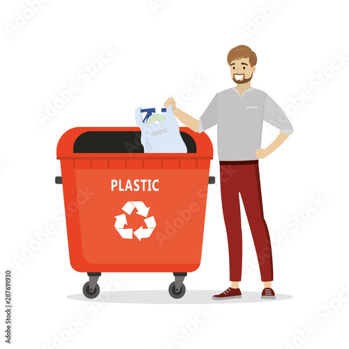 Man throwing plastic garbage in the big trash can. Recycling and ecological concept.