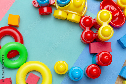 Colorful child kid’s education toys pattern background copy space on the bright background. Childhood infancy children babies concept © vitalis83