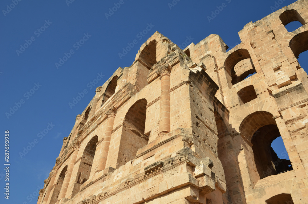 Roman amphitheater of El Jem is an ancient African colosseum in El Djem, Tunisia.