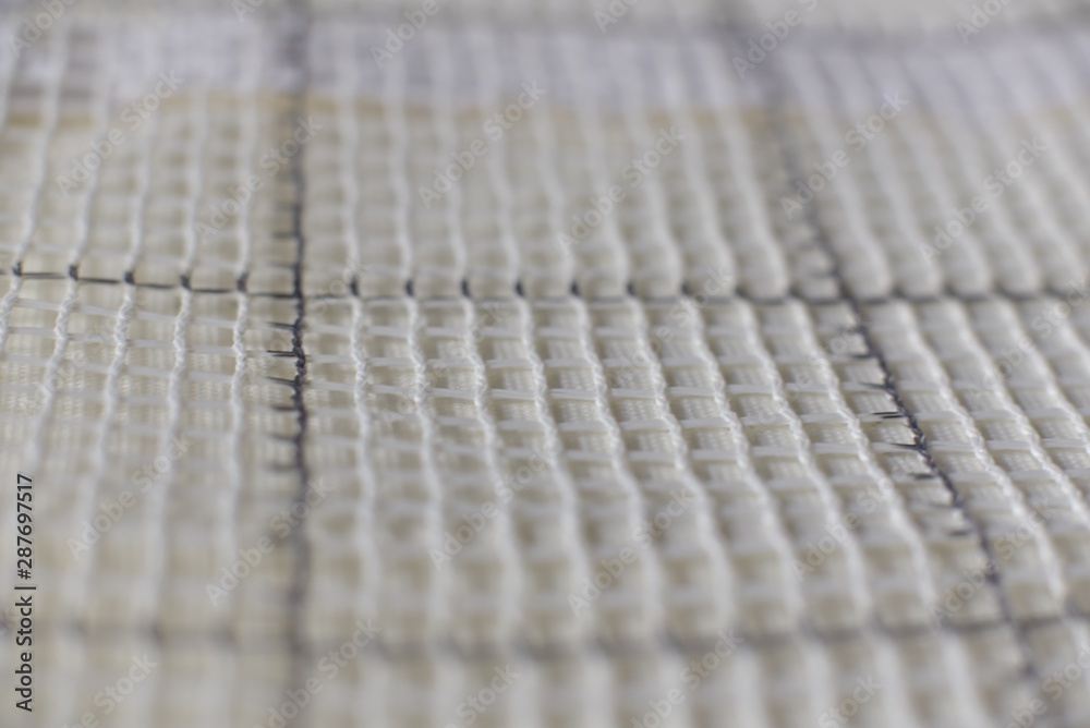 Closeup on latch hook canvas Closeup on latch hook canvas