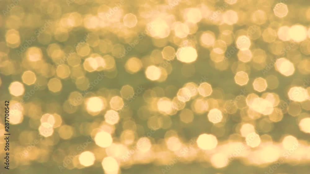 Golden organic bokeh background. Real time full hd video footage.