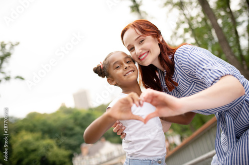 Daughter and mommy feeling truly contended together