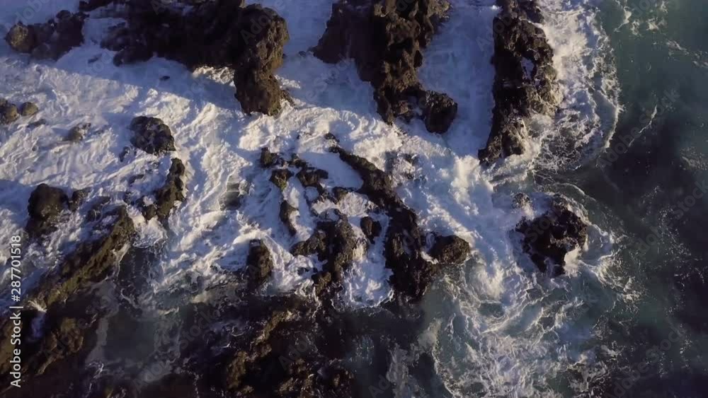 Reveal Of Powerful Ocean Waves Hitting Rocks On The Coastline Reveal Of Powerful Ocean Waves Hitting Rocks On The Coastline