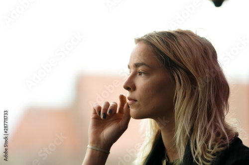 Photos Sad looking woman looking away thinking