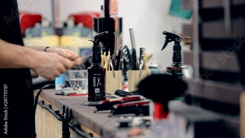 work of a male professional hairdresser in a men's salon