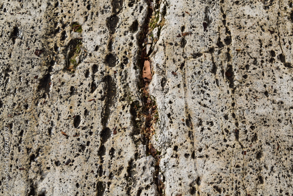 Detail of an old wall eroded by water Detail of an old wall eroded by water