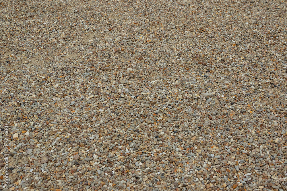background of small pebbles, multi-colored texture background of small pebble stone background of small pebbles, multi-colored texture background of small pebble stone