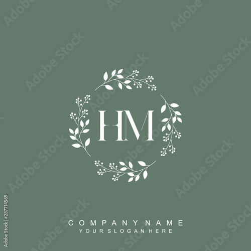 letter HM surrounded by beautiful and elegant flowers and leaves. Wedding monogram logo template. Fashion Logo template Vectors,