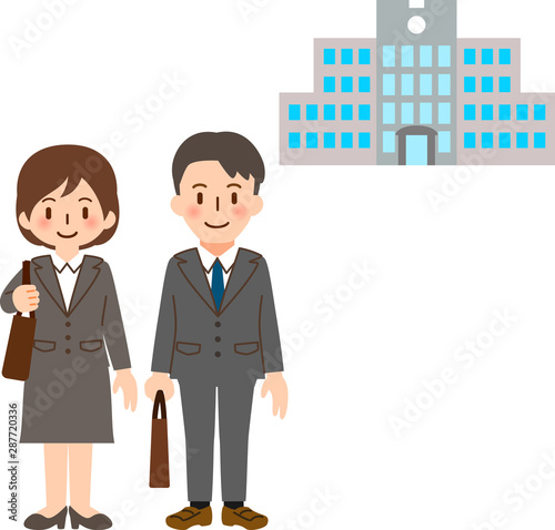 大学の建物とスーツを着た若い男女
