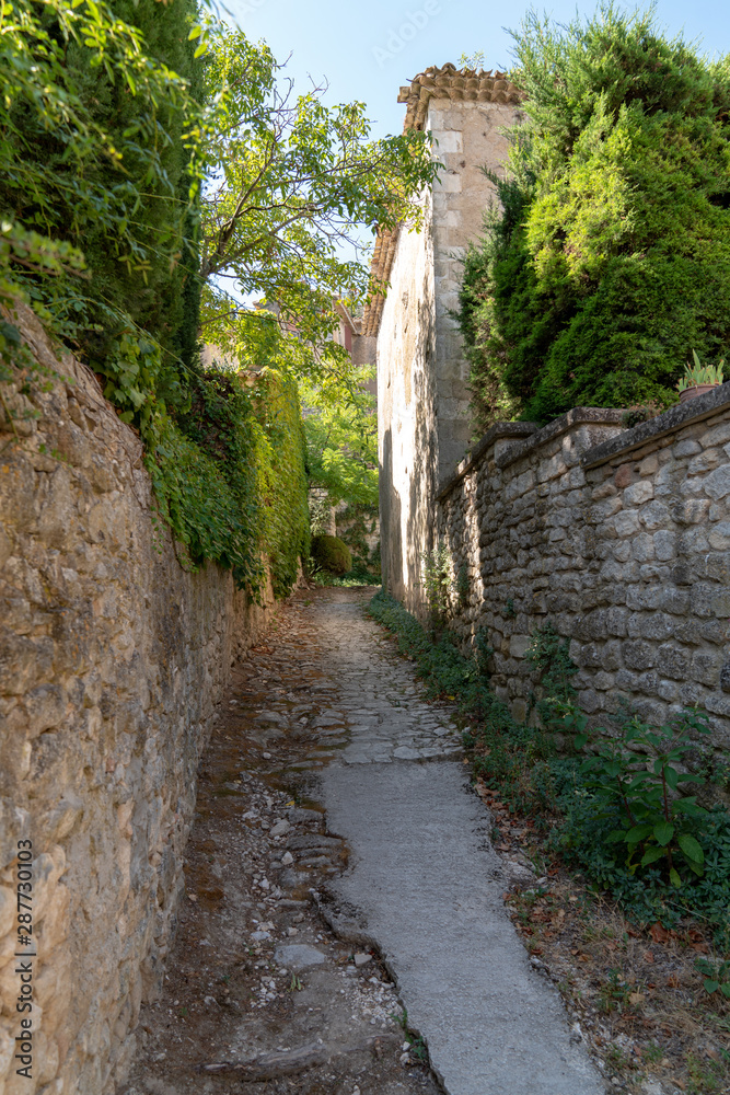 small alley in village medieval Oppède-Le-Vieux Lubéron France