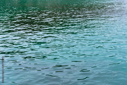 Emerald-colored sea water  texture  surface.