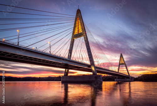 Budapest - Hungary - Megyeri Bridge over River Danube at sunset with beautiful clouds and sky