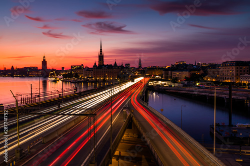 Scenic view of old buildings and car traffic at the bridge Stockholm, Sweden.