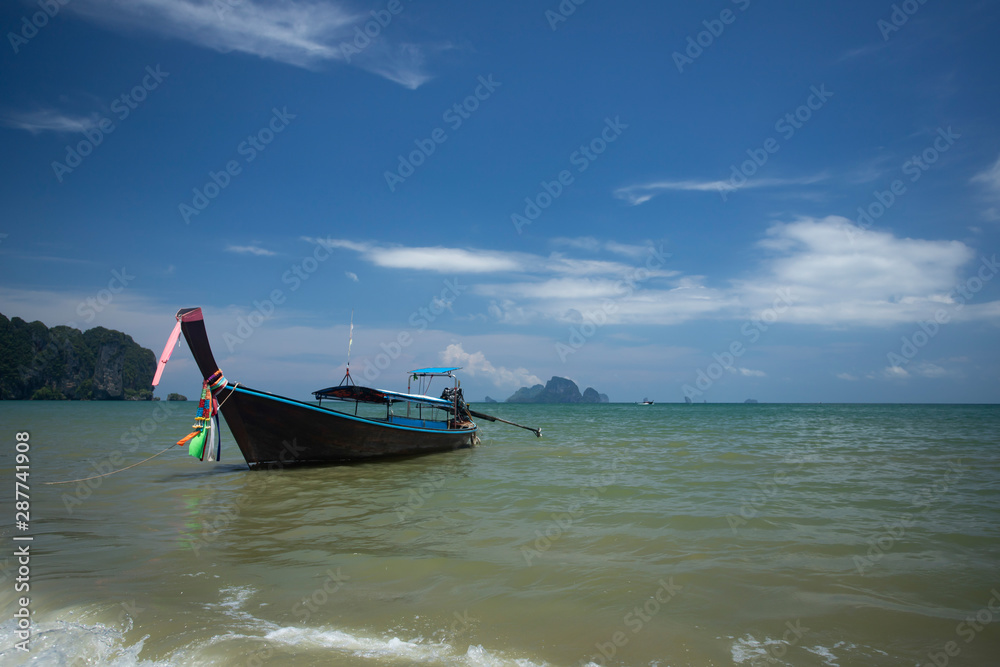 Ao Nang Beach with traditional longtail boats, Krabi, Thailand. Ao Nang Beach with traditional longtail boats, Krabi, Thailand.
