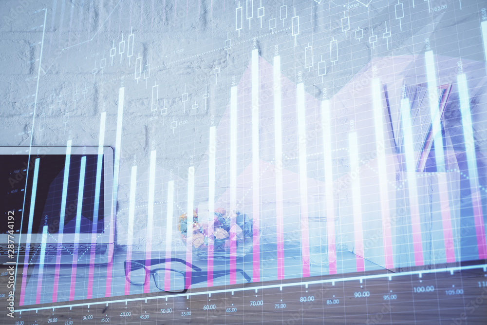 Financial market graph hologram and personal computer on background. Double exposure. Concept of forex. Financial market graph hologram and personal computer on background. Double exposure. Concept of forex.