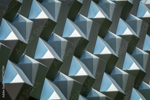 Obraz na płótnie Close-up photo of technological metal structure. Abstract background image on the subject of modern architecture, industry or technology. w salonie
