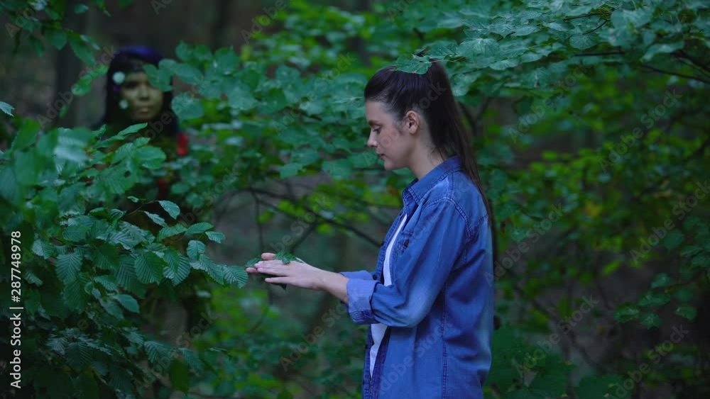 Young woman meeting mother earth in forest, nature unity, safe environment Young woman meeting mother earth in forest, nature unity, safe environment