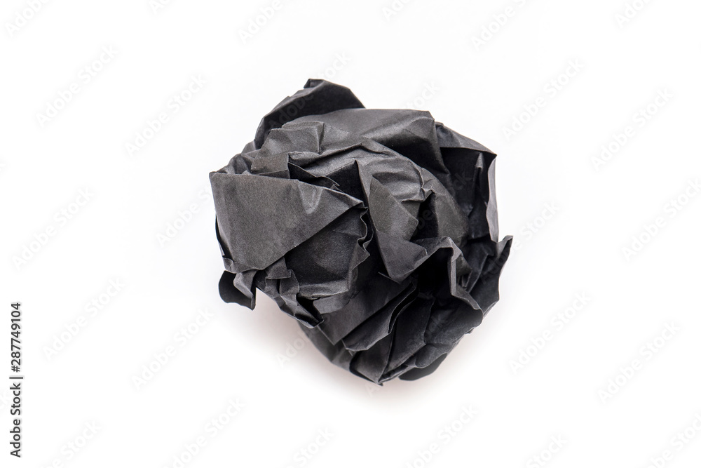 Real Black Paper crumpled as Ball, wrinkled paper texture, isolated on white Background