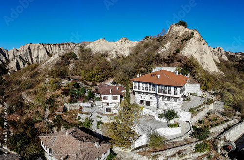 Aerial view to Melnik,the smallest town in Bulgaria with sand pyraminds and old house. photo