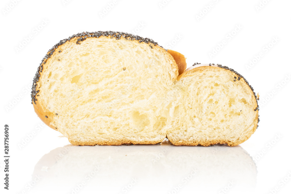 One slice of twisted poppy seed bun cross section isolated on white background