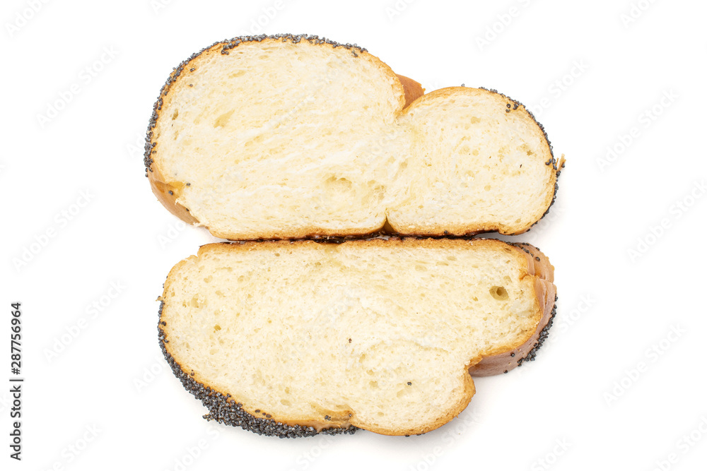 Group of two slices of fresh twisted poppy seed bun flatlay isolated on white background Group of two slices of fresh twisted poppy seed bun flatlay isolated on white background