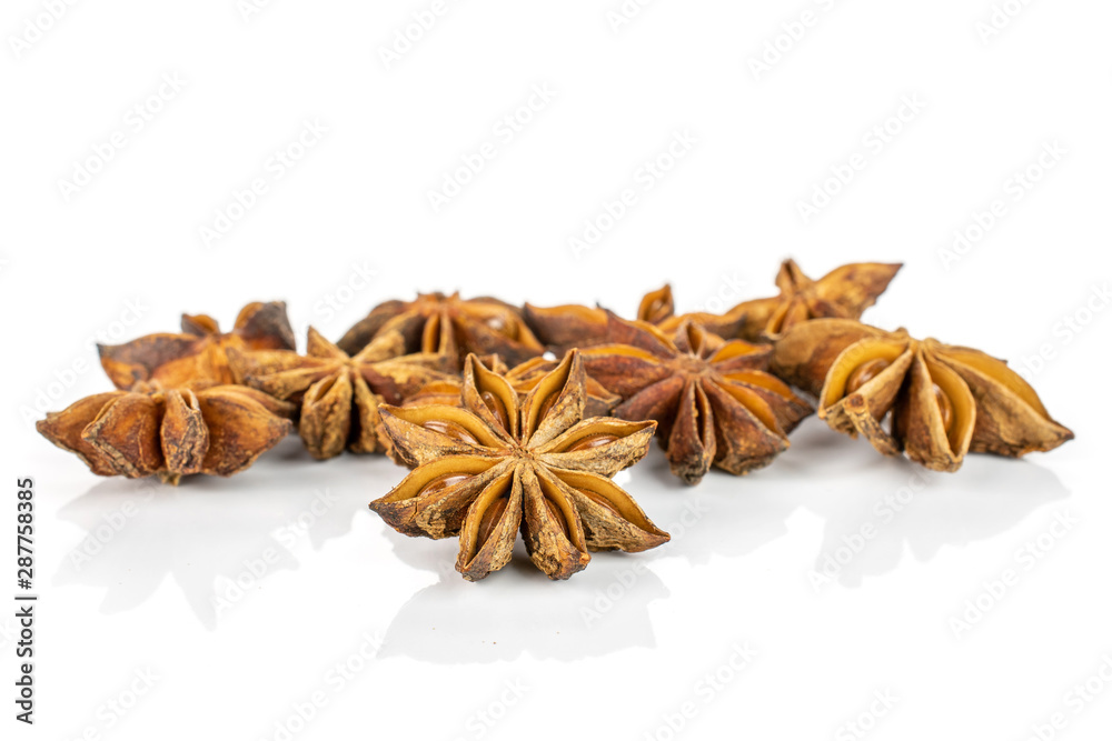 Lot of whole dry brown star anise illicium verum isolated on white background Lot of whole dry brown star anise illicium verum isolated on white background