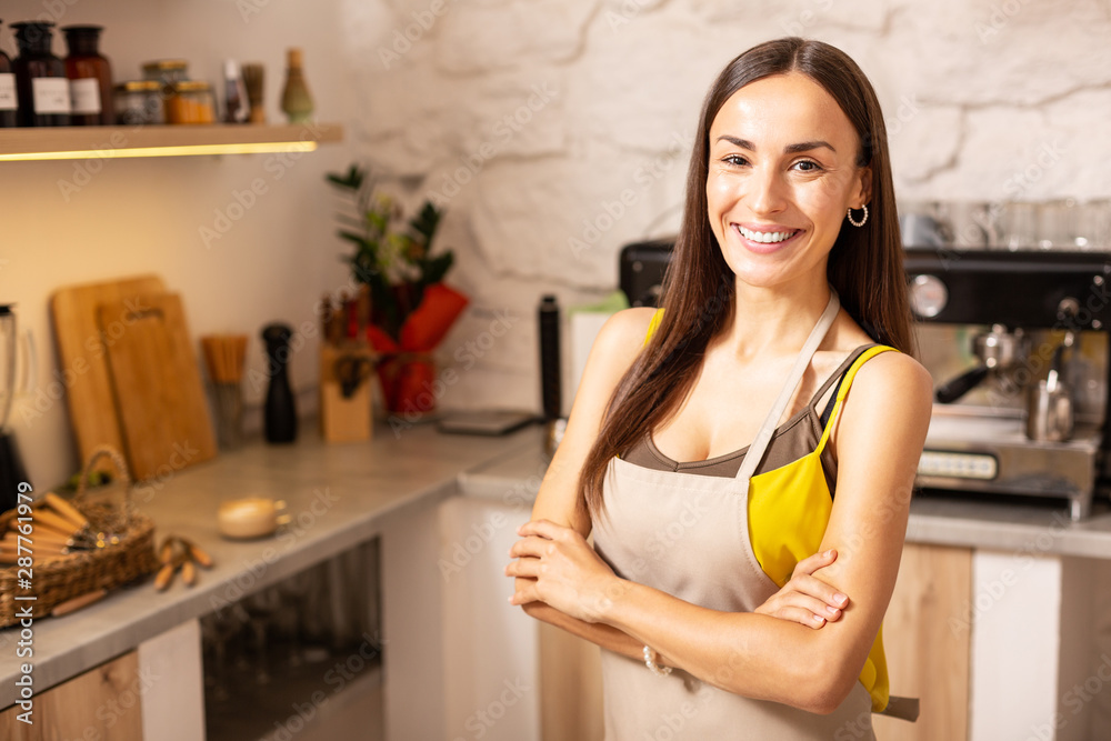 Businesswoman owning coffeehouse feeling extremely happy Businesswoman owning coffeehouse feeling extremely happy