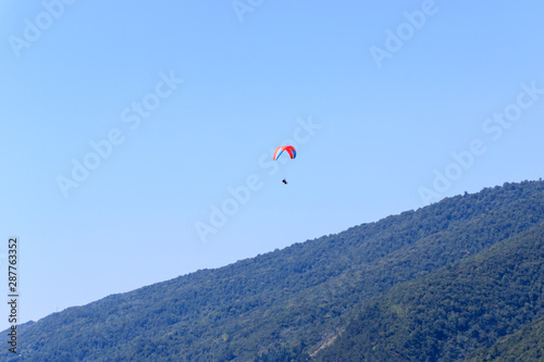 paragliding over the mountains.