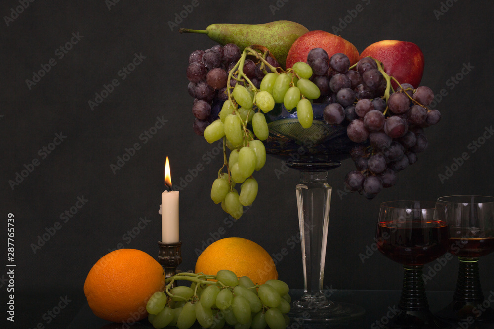 fruits in an old vase and wine fruits in an old vase and wine