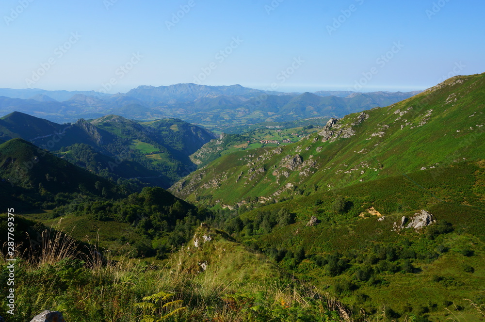 top view of the green mountains of Spain