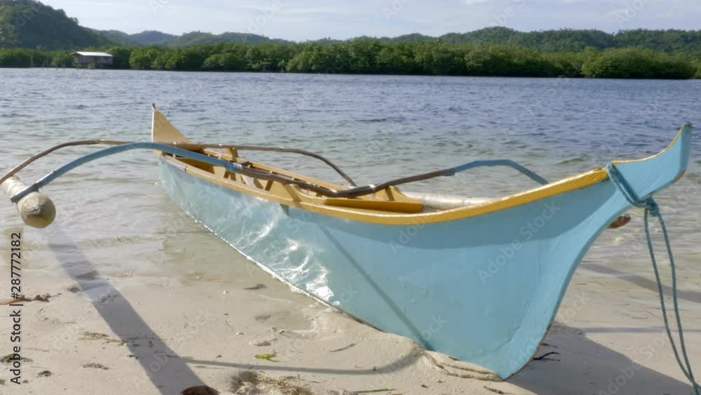Long boat floating on shoreline beautiful blue tropical island seascape. Siargo, Philippines. Long boat floating on shoreline beautiful blue tropical island seascape. Siargo, Philippines.