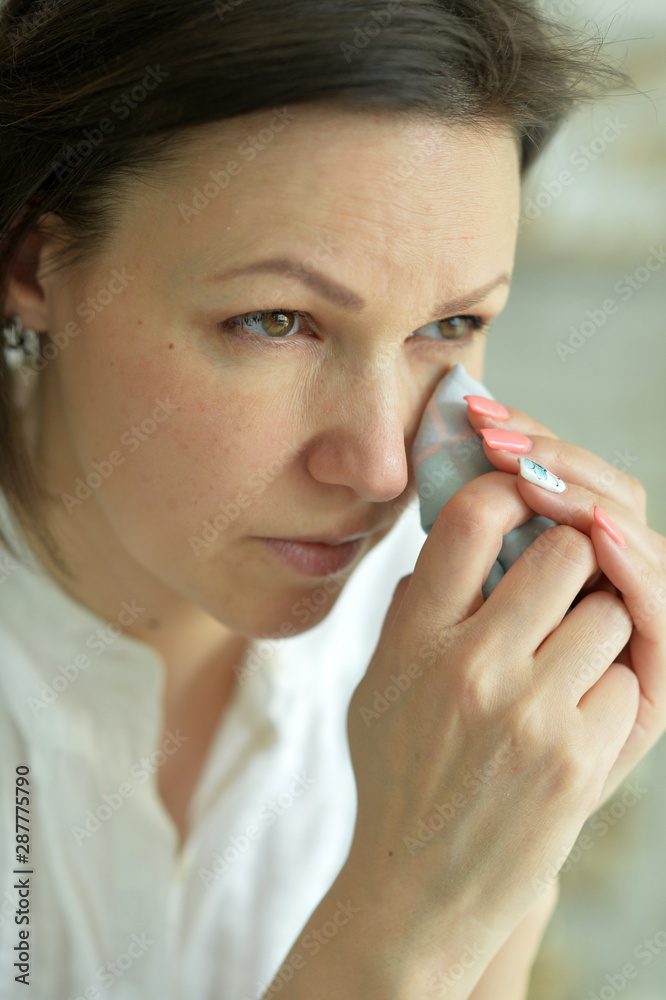 Portrait of a beautiful brunette woman crying Portrait of a beautiful brunette woman crying