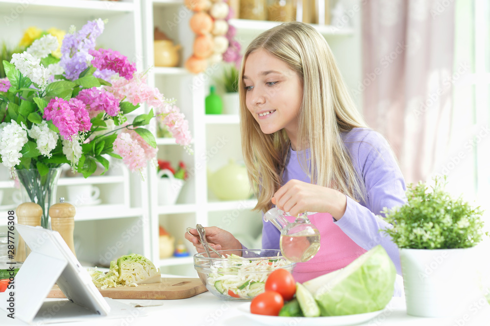 Portrait of cute girl preparing fresh salad Portrait of cute girl preparing fresh salad