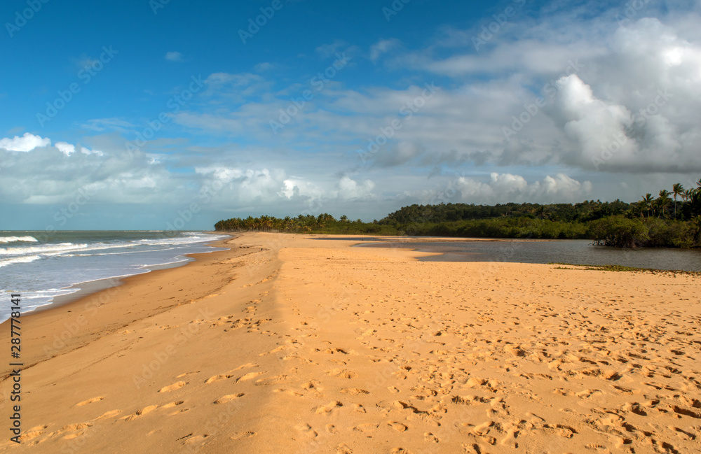 Beach between river and sea