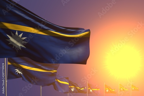 nice many Nauru flags placed diagonal on sunset with space for your text - any occasion flag 3d illustration.. © Dancing Man