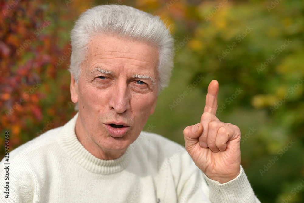 Portrait of a thoughtful senior man outdoors Portrait of a thoughtful senior man outdoors
