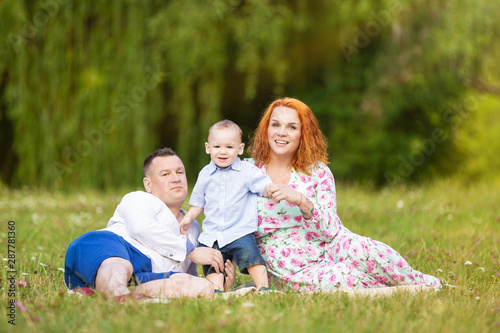 Happy family with son in the park © fotorince