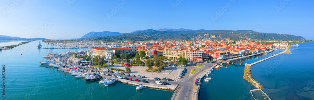 Lefkas (Lefkada) town, amazing view at the small marina for the fishing boats with the nice wooden bridge and promenade, Ionian island, Greece